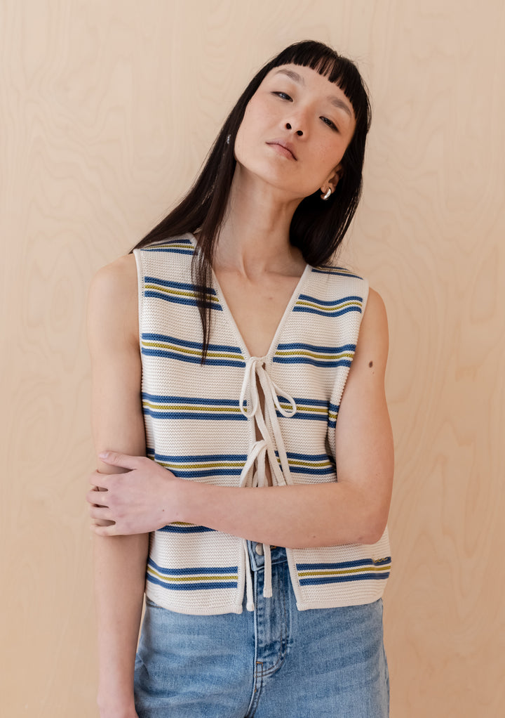 TBCo Cotton Knitted Vest in cream with blue and green stripes, featuring front tie closures and sleeveless design