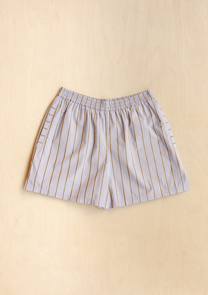 TBCo Cotton Shorts in lilac with olive stripes, elasticated waist, relaxed fit loungewear on beige background