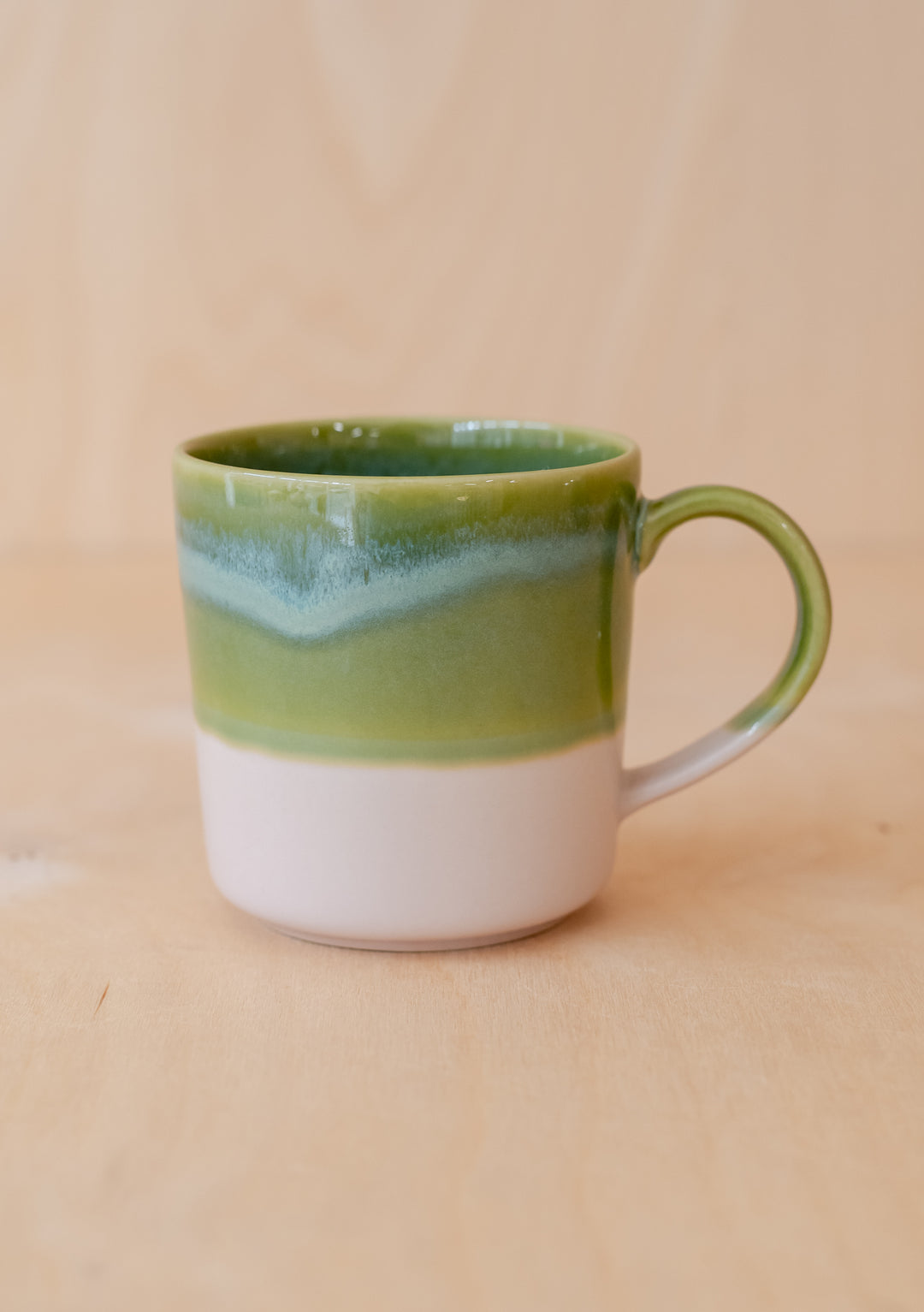 TBCo Green Dip Mug featuring hand-painted ceramic design with two-tone green and white glazed finish, handcrafted in Portugal