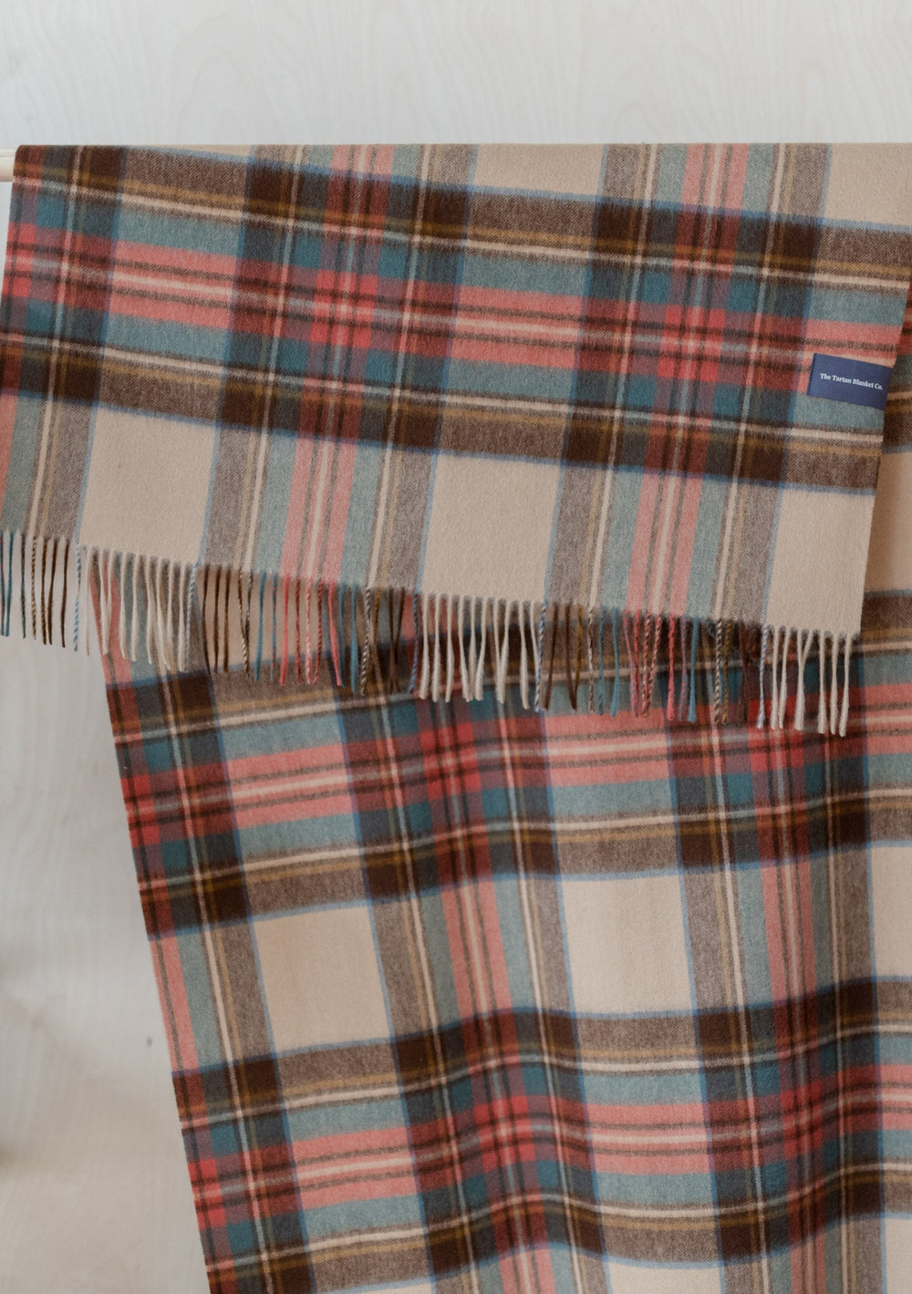 TBCo Stewart Dress Antique Tartan lambswool blanket scarf featuring traditional plaid pattern in coral, blue and brown tones