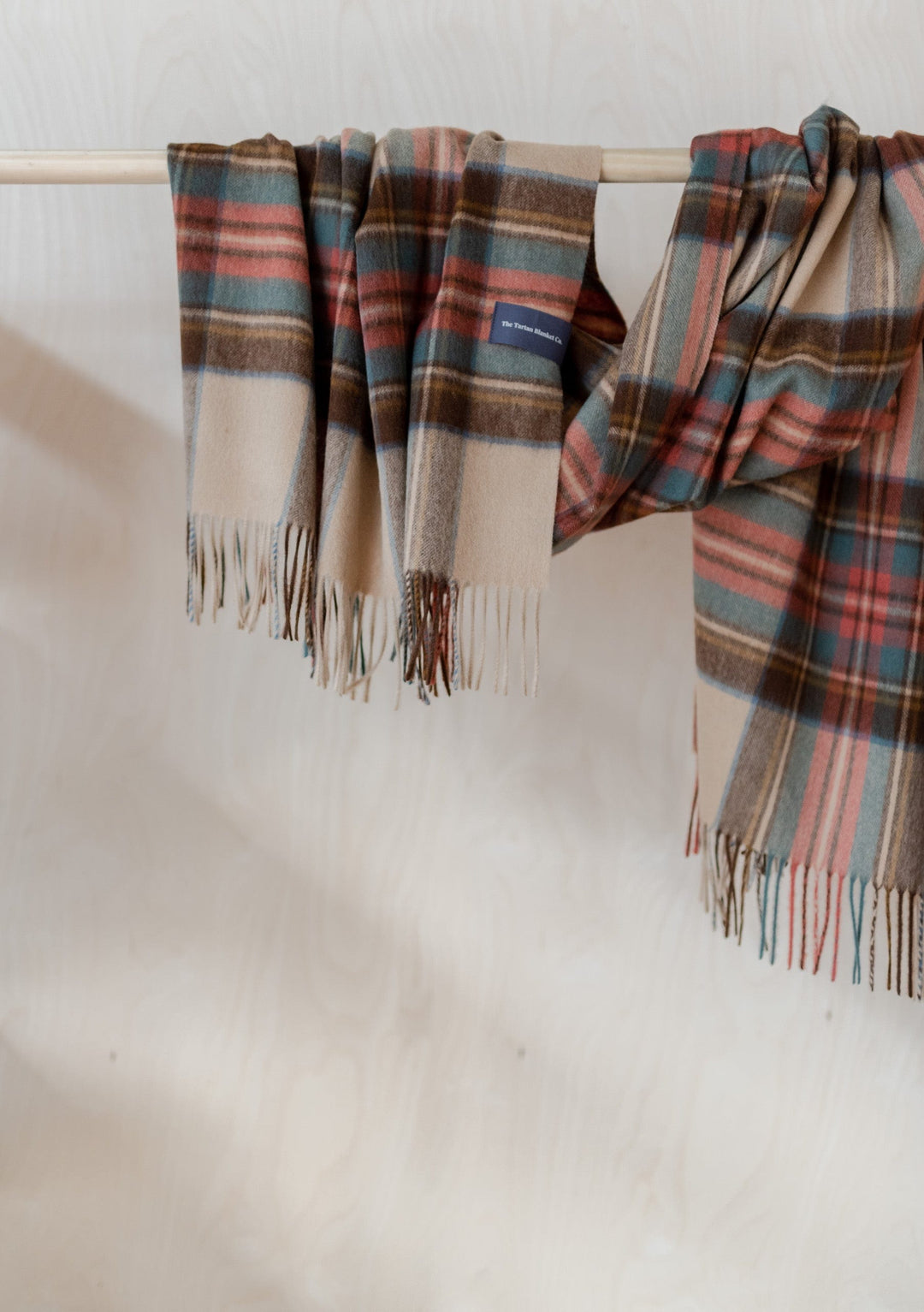 TBCo Stewart Dress Antique Tartan cashmere blanket scarf draped elegantly displaying plaid pattern and fringed edges