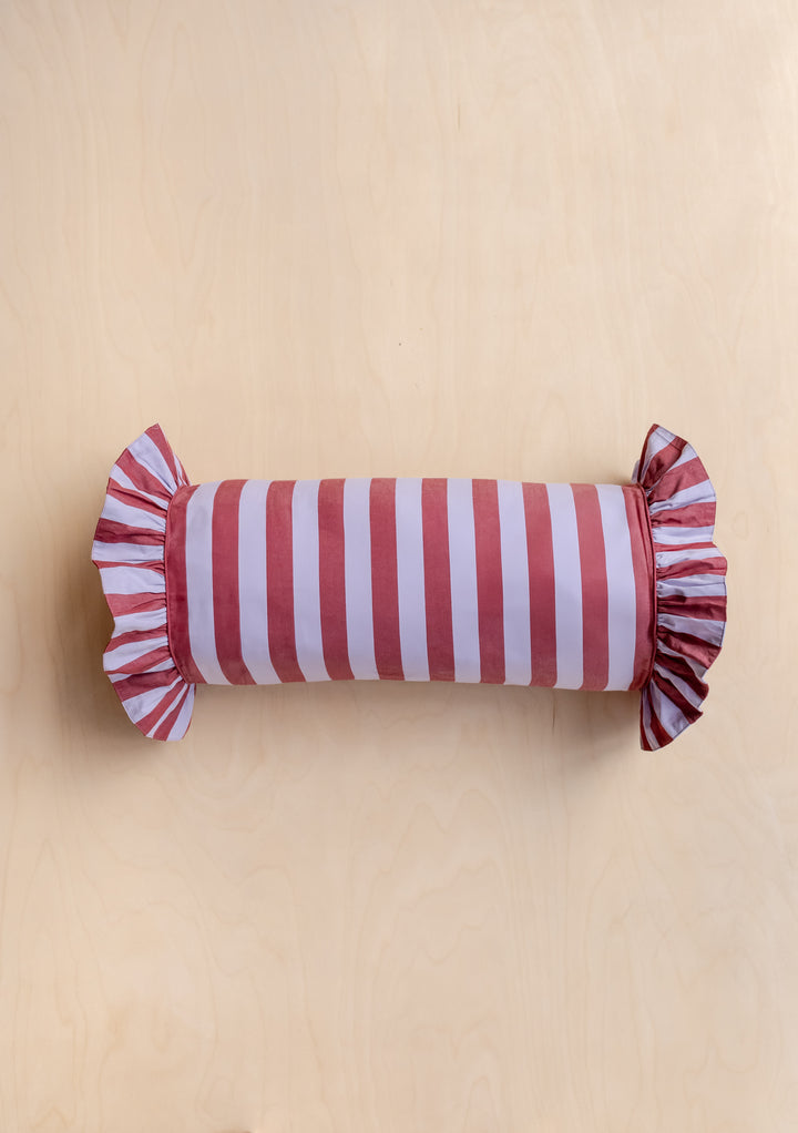 TBCo Cotton Cushion Cover in Lilac Stripe, featuring alternating vertical stripes and ruffled ends, displayed flat on a wooden surface for a classic yet modern look.