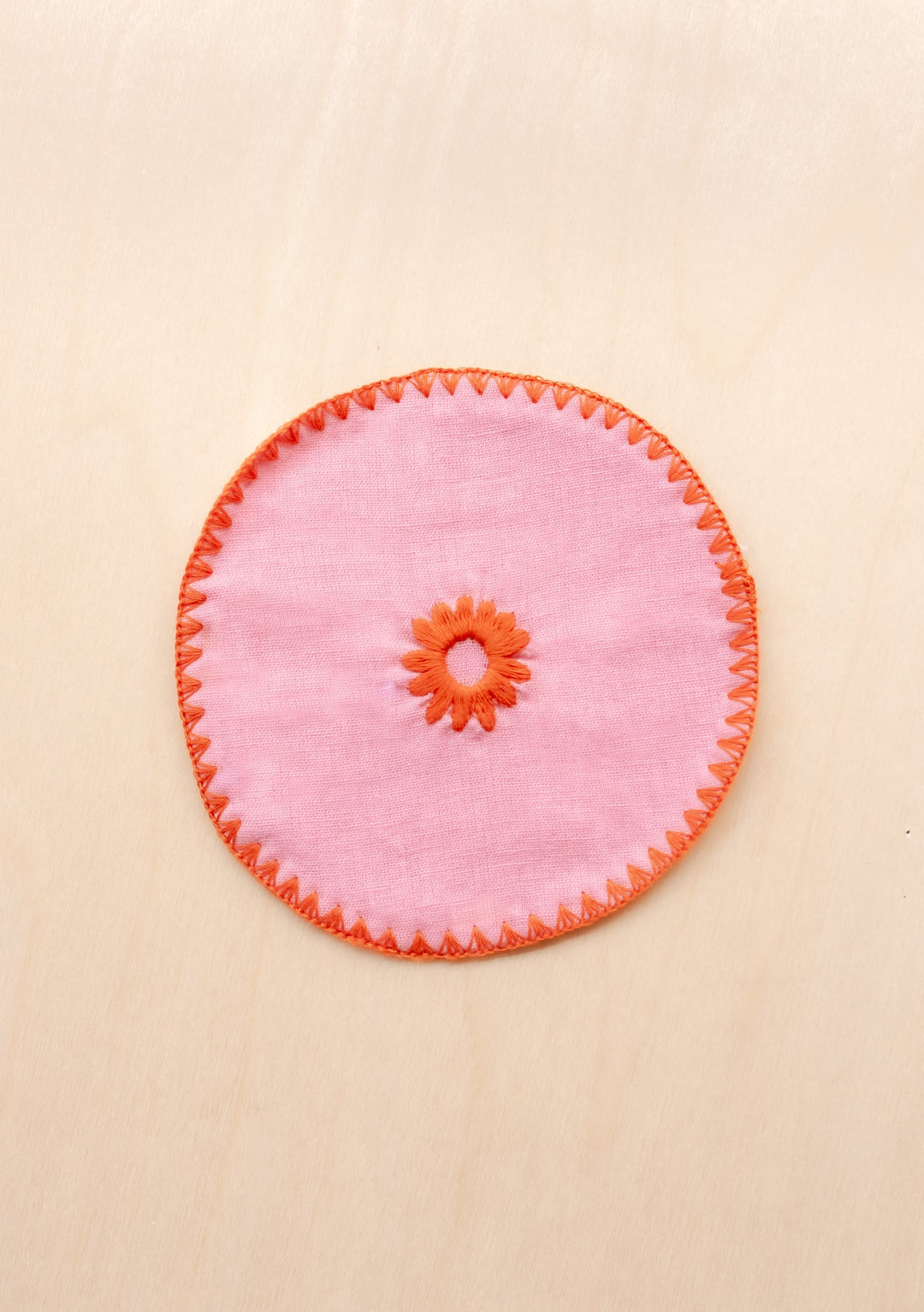 TBCo cotton coasters in pink linen featuring a soft woven texture design . Designed for stylish and practical table protection, these eco-friendly coasters add warmth and sophistication to any home decor.