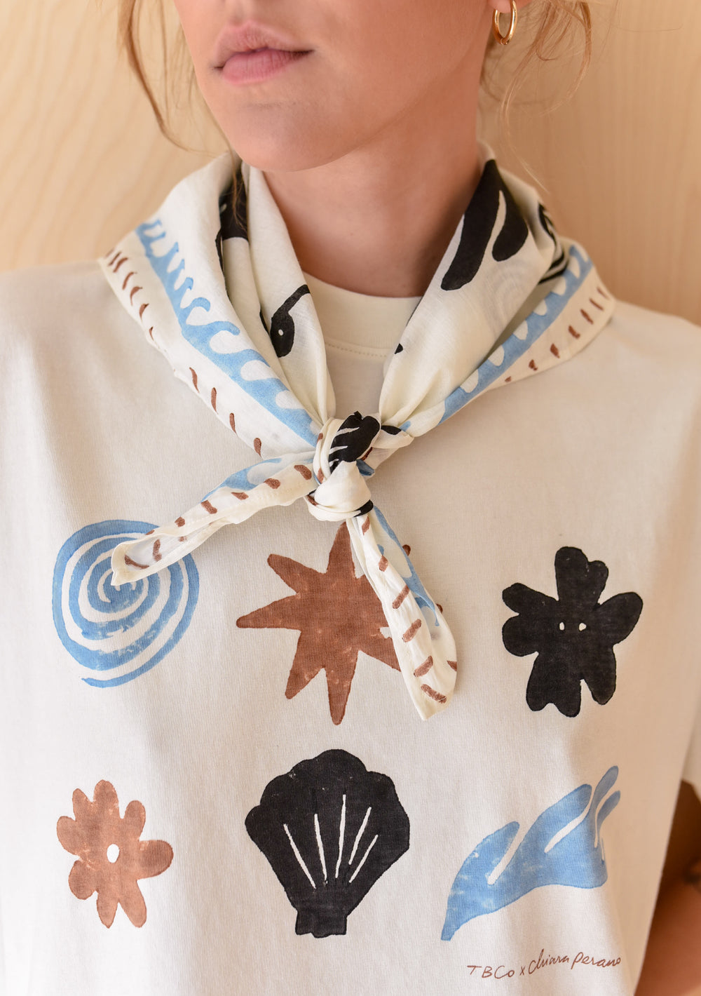 TBCo Chiara Perano Artist Series Cotton Square Triangle Neck Scarf and Cotton T-shirt worn by a model