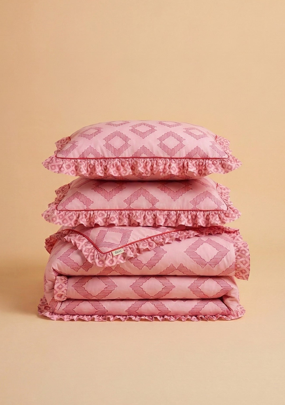 Paire de taies d'oreiller en coton à motif diamant rose