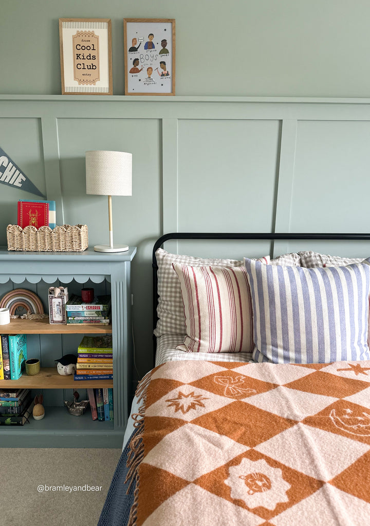 Babydecke aus Lammwolle im Harlekin-Jacquard 