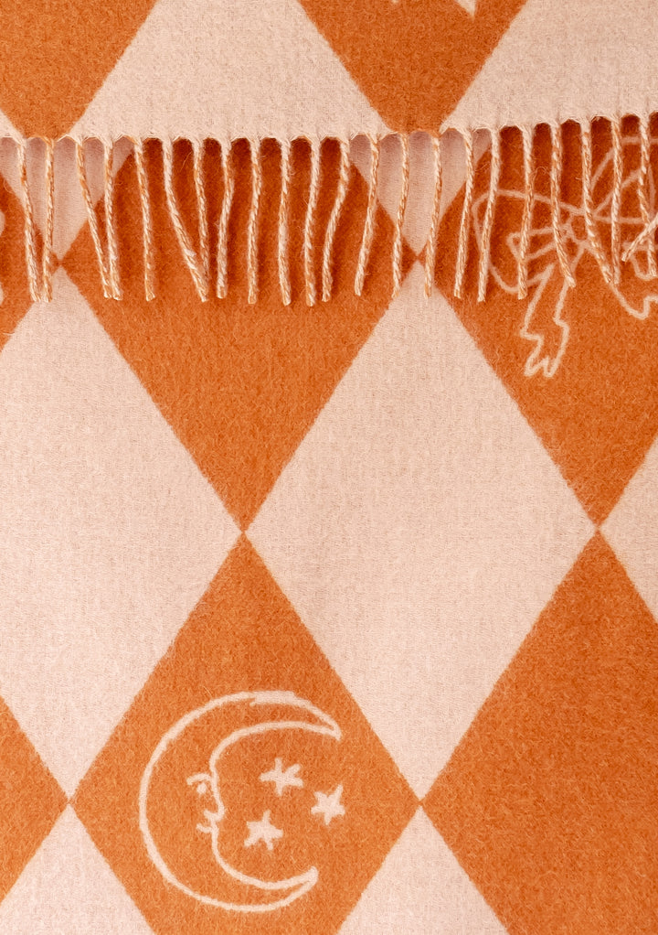 Babydecke aus Lammwolle im Harlekin-Jacquard 