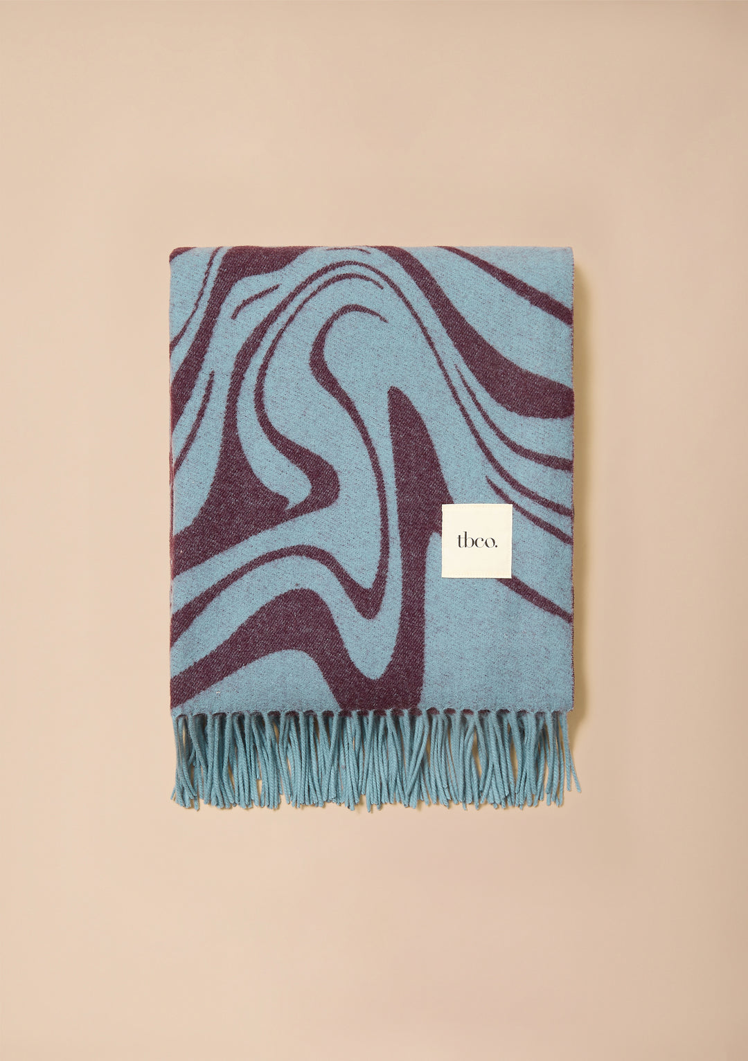Couverture en laine d'agneau effet marbre bleu