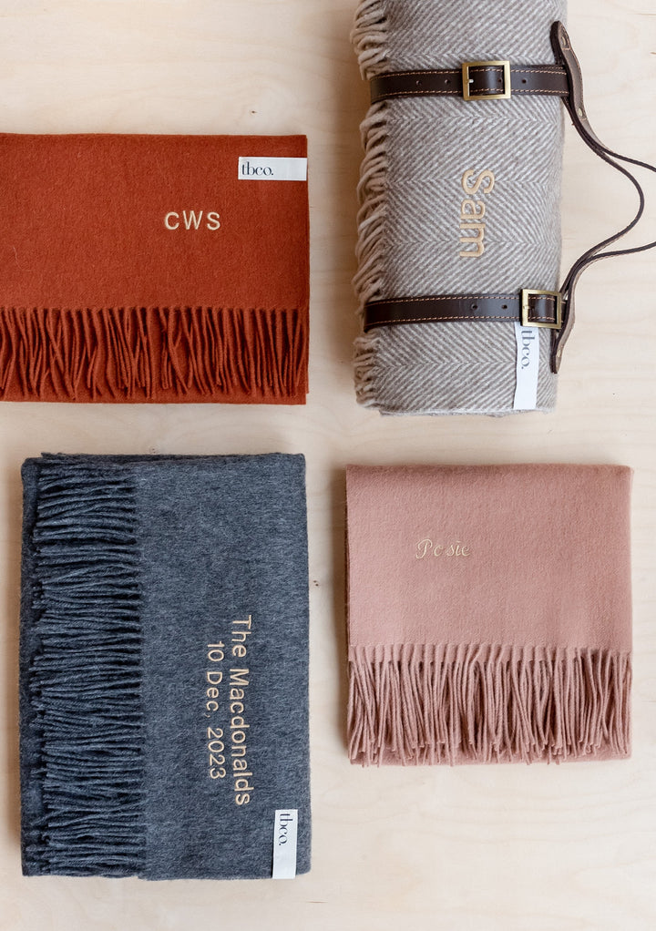Babydecke aus Lammwolle im Harlekin-Jacquard 