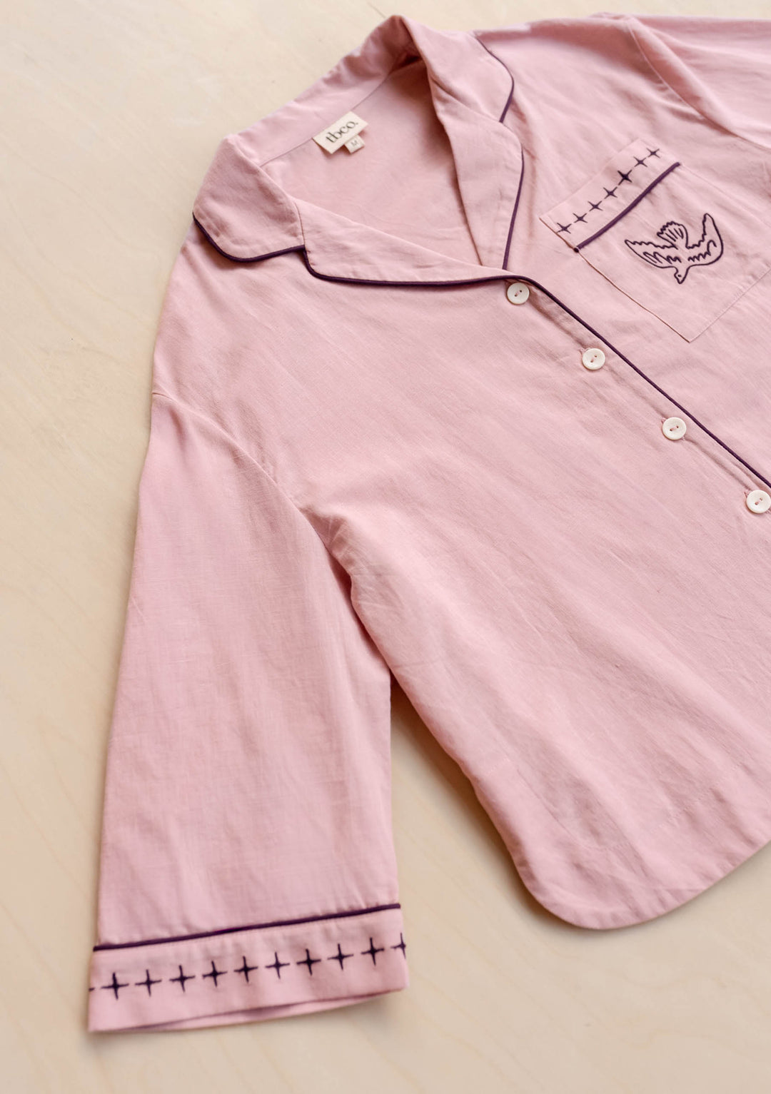 Cropped Cotton & Linen Pyjamas in Pink by TBCo showing detailed blackberry embroidery in gallery position 7 portrait view