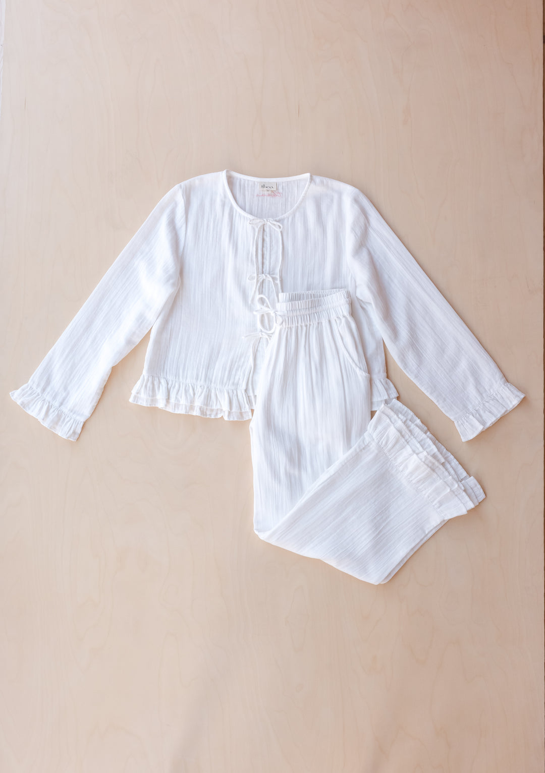 TBCo Ankle Grazer Cotton Pyjamas in White Ruffle with breathable natural and recycled fibres, Certified B-Corp, Women-Founded, designed to make an impact