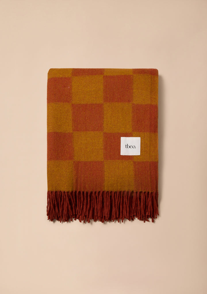 Decke aus recycelter Wolle mit Senf- und Orange-Schachbrettmuster