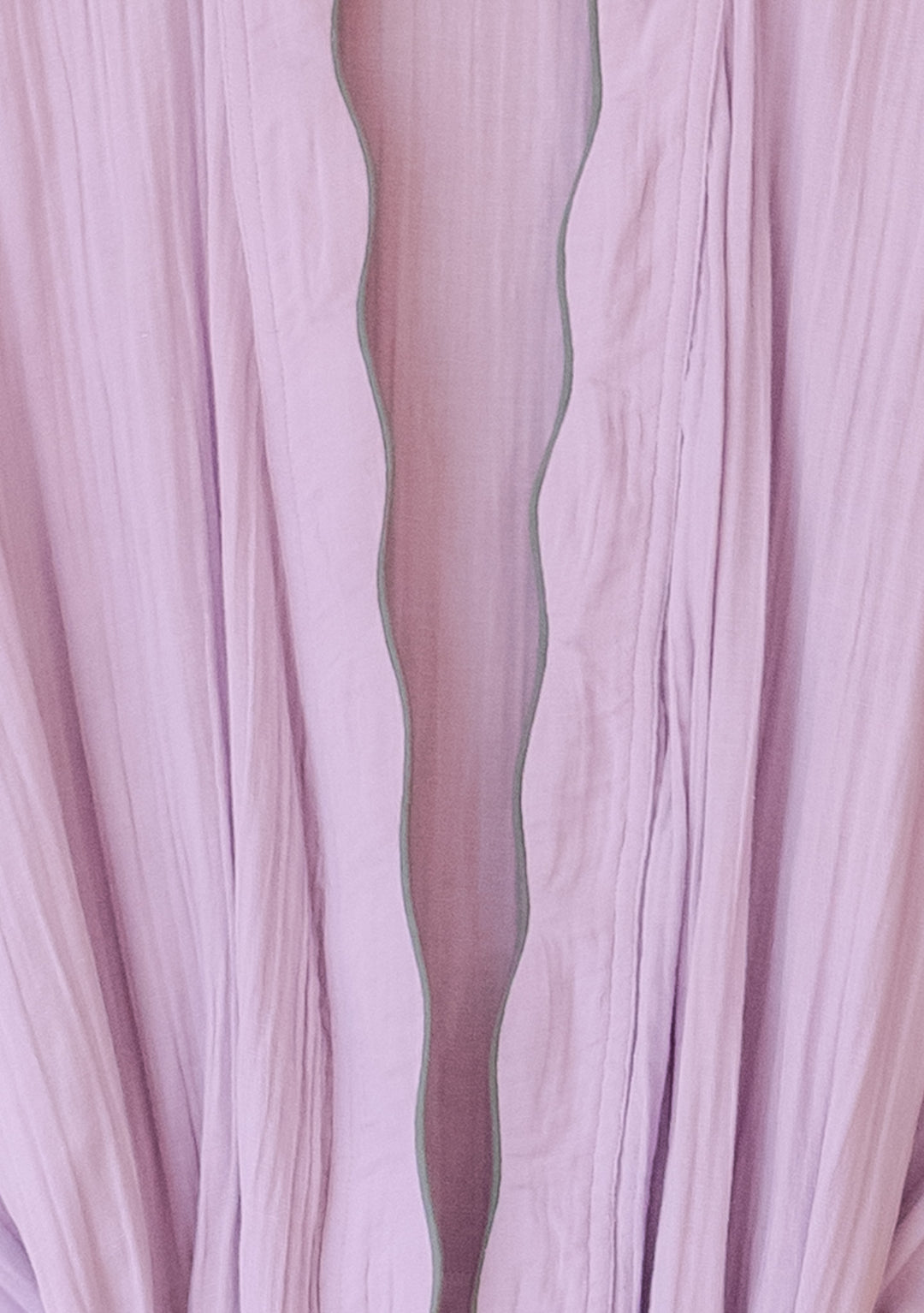 Close-up of scalloped edge detail on TBCo Cotton Robe in Lilac, gallery position 5, portrait orientation.