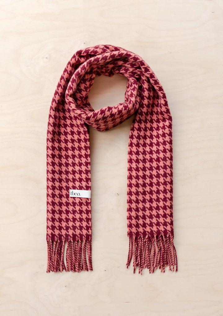 TBCo Lambswool Oversized Scarf in Berry Houndstooth pattern with fringed ends, draped elegantly against light background