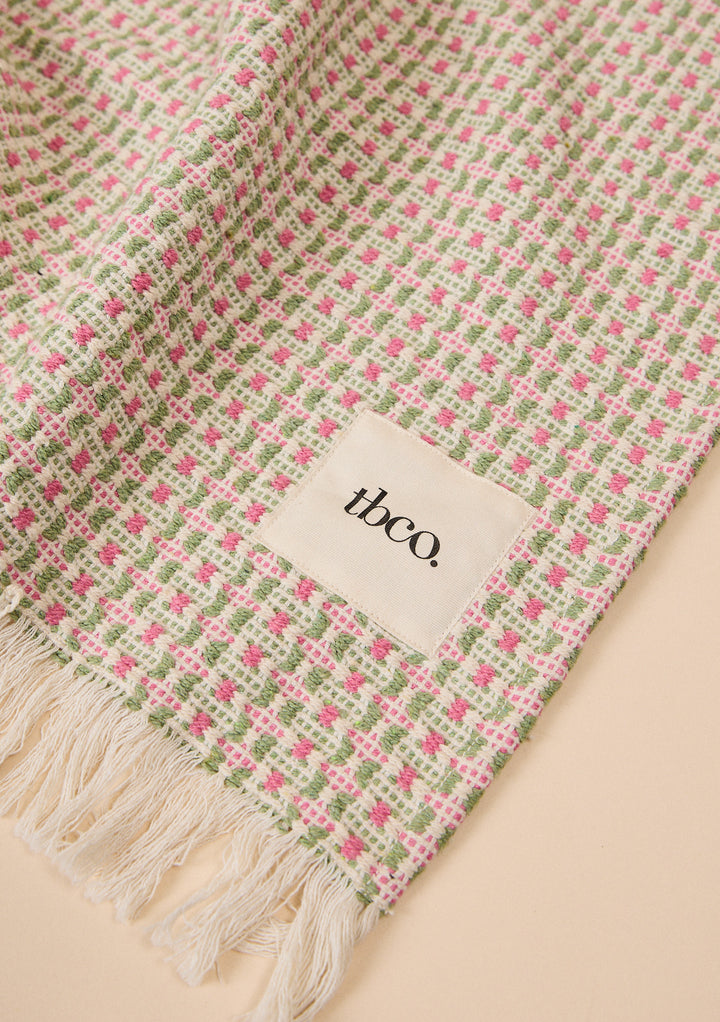Cotton Throw in Rose Geometric by TBCo with woven jacquard design, natural and recycled fibres, Certified B-Corp, women-founded, designed to make an impact