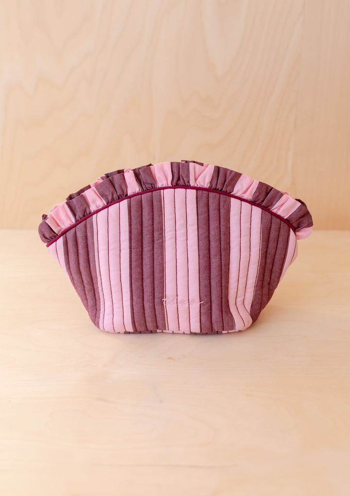 Curved Cotton Wash Bag in Pink & Burgundy Stripe by TBCo, featuring ruffled top and quilted striped design detail